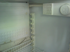 How do you replace a refrigerator thermostat?